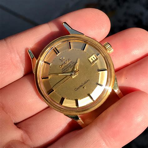 vintage omega constellation 18k gold watch.